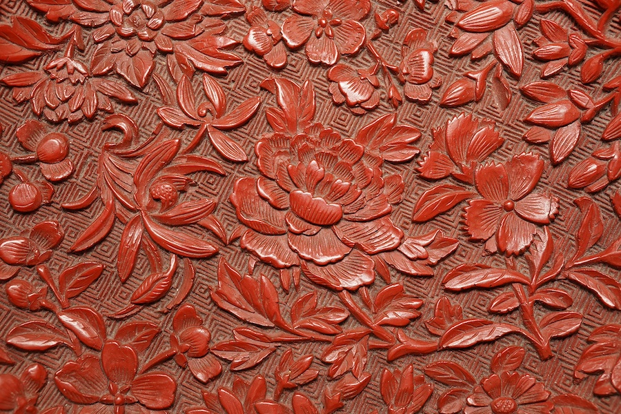 An unusual Chinese cinnabar lacquer ‘thousand flower’ footed dish, 18th/19th century